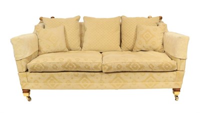 Lot 1243 - A Duresta four-seater upholstered sofa, 225cm by 110cm by 88cm together with a matching...