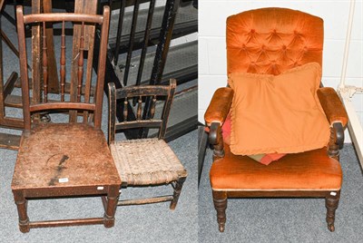 Lot 1263 - A Victorian mahogany upholstered fireside armchair, a mahogany country chair and a child's rush...