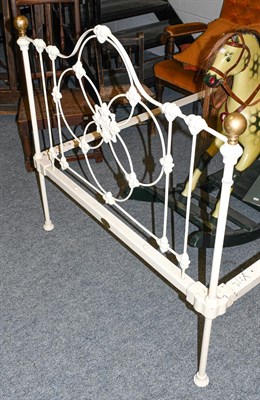 Lot 1265 - A pair of Victorian white painted metal bed steads by Seventh Heaven, 201cm by 108cm
