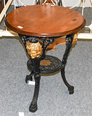 Lot 1271 - A Victorian cast iron pub table teak-topped by Gaskills & Chambers Lyd, Leeds 60cm diameter by 70cm