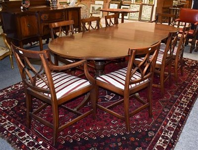 Lot 1276 - A Regency style mahogany dining suite, comprising a twin pillar dining table with additional...