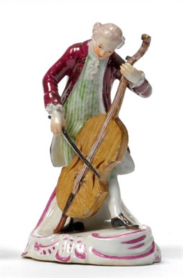 Lot 151 - A German Porcelain Figure of a Cellist, probably Thuringian, circa 1780, the standing figure...