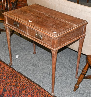 Lot 1281 - A 19th century oak two-drawer side table raised plain turned supports terminating on pad feet, 78cm