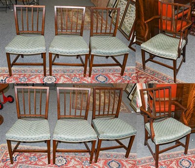 Lot 1286 - A set of eight George III mahogany stick back dining chairs, including a pair of carver armchairs