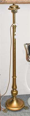 Lot 1289 - Brass rise and fall standard lamp raised on three paw feet