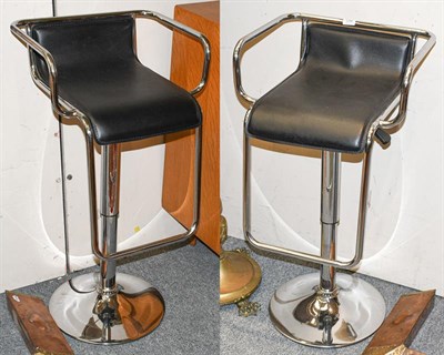 Lot 1290 - A pair of modern chrome breakfast bar swivel stools
