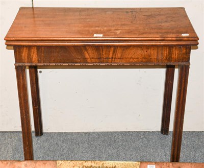 Lot 1291 - George III mahogany fold over tea table 84cm by 42cm by 73cm