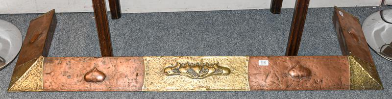 Lot 1292 - An Arts & Crafts copper and brass fire curb fender, 145cm by 43cm external, 122cm by 30cm internal