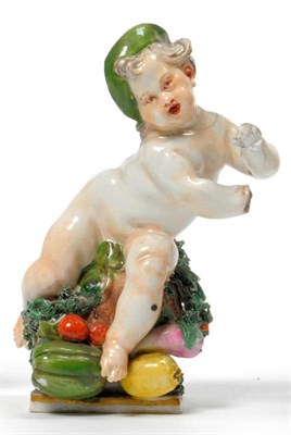Lot 153 - A Nymphenburg Porcelain Figure of a Putto as Summer, circa 1770, the naked figure wearing a...