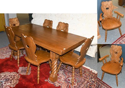 Lot 1302 - An Arts & Crafts Bavarian carved oak dining room suite, made by Klaus Trommer (Tuntenhausen), April