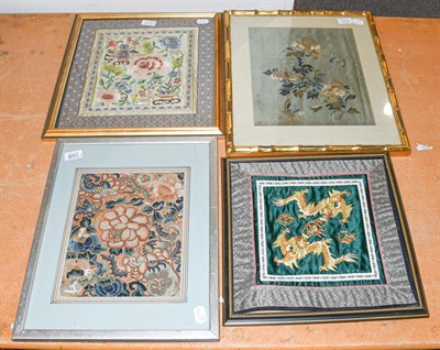 Lot 1328 - An early 20th century Chinese silk embroidery of floral design; another worked on silk with...