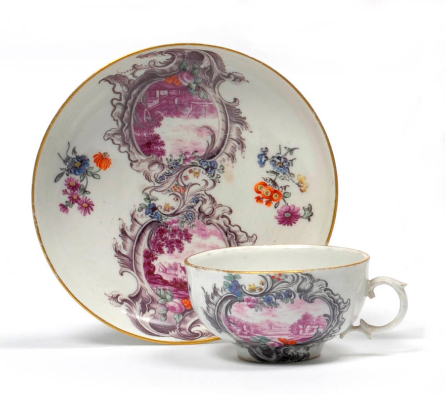 Lot 163 - A Furstenberg Porcelain Teacup and Saucer, circa 1765, painted in puce monochrome with...