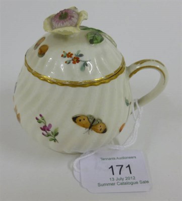 Lot 171 - A Vienna Porcelain Custard Cup and Cover, 19th century, of wrythen form with flower finial, painted
