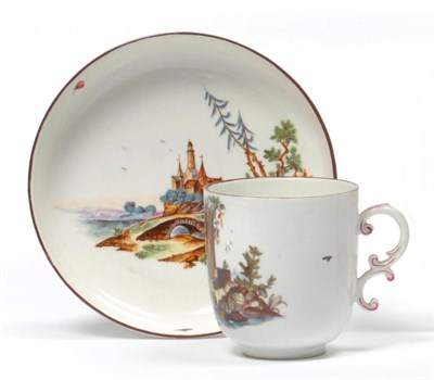 Lot 175 - A Höchst Porcelain Coffee Cup and Saucer, circa 1765, with scroll moulded handle, painted in...