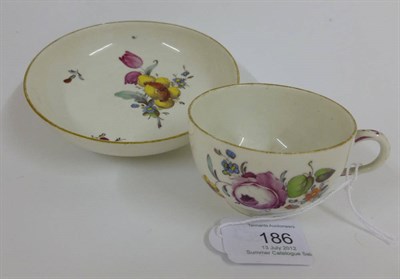 Lot 186 - A Höchst Porcelain Teacup and Saucer, circa 1770, painted in colours with flower sprays and...