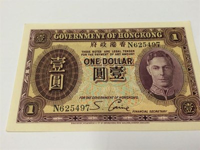 Lot 2154 - A Ring Binder Containing a Small Collection of 24 x Commonwealth Banknotes comprising: Hong...