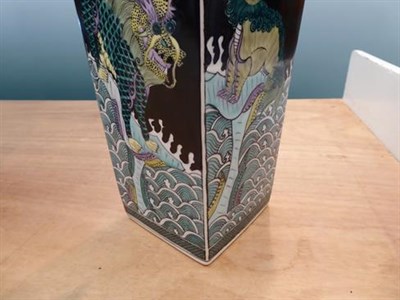 Lot 184 - A pair of 20th Century Chinese famille noir tapering square section vases decorated with dogs...