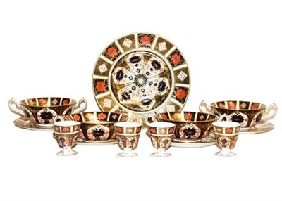 Lot 187 - ~A set of four Royal Crown Derby Imari twin handled soup bowls and saucers a similar bowl and...