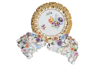 Lot 189 - Meissen scalloped dish painted with flowers on a gilt border with cross sword mark together...
