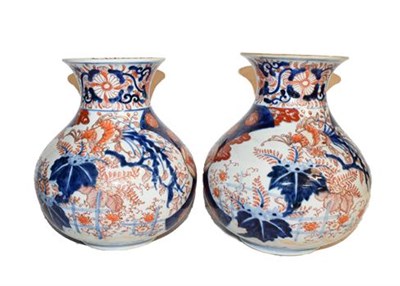 Lot 192 - A matched pair of Japanese globular vases
