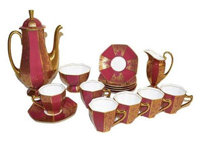 Lot 210 - ~A 1930s Royal Doulton coffee service with gilt decoration on a red ground comprising a coffee pot