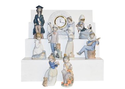 Lot 215 - A collection of Lladro and Nao figures (9)