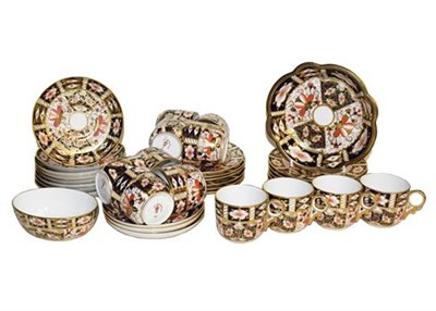 Lot 216 - Royal Crown Derby Imari, a set of twelve coffee cans, saucers and side plates, a small oval...