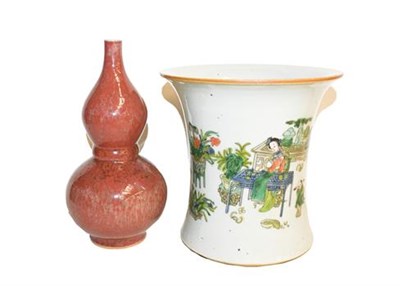 Lot 218 - A Famille Verte decorated vase, 18cm high and a Sang de boeuf double gourd vase, 21cm high
