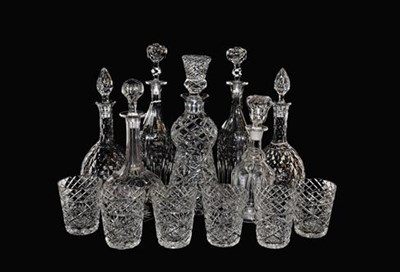 Lot 219 - ~A 20th century good quality cut glass decanter in the form of a thistle and a matching set of...
