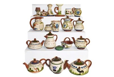Lot 226 - ~A collection of Torquay Mottoware pottery including teapots, puzzle jug candlesticks etc