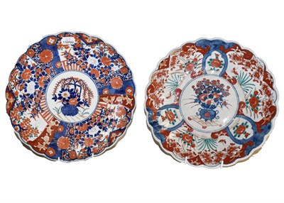 Lot 231 - ~A 19th century Japanese Imari charger together with a later example, both 30cm diameter...