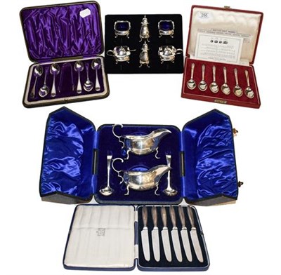 Lot 250 - ~A pair of cased silver sauce boats and ladles together with cased silver teaspoons, each...