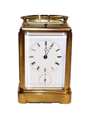 Lot 270 - A French brass striking repeating alarm carriage clock, circa 1890, movement striking on a bell