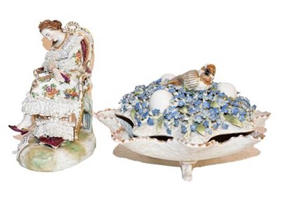 Lot 271 - A German porcelain crinoline figure of a seated lady and a Continental floral encrusted bowl...