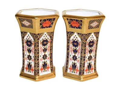 Lot 282 - ~ A pair of hexagonal Royal Crown Derby vases in the Imari pattern, 12cm high