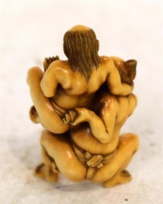 Lot 286 - A 19th century Japanese Ivory Okimono, depicting two sumo wrestlers, 5.5cm high