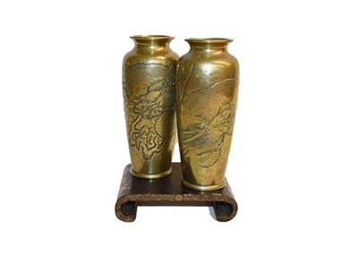 Lot 293 - A pair of Japanese Meji period bronze vases decorated in relief with dragons together with a...