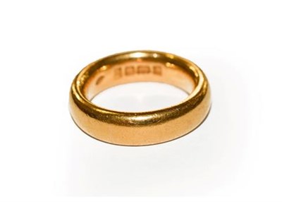 Lot 308 - A 22 carat gold band ring, finger size J1/2