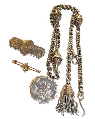Lot 313 - A tassel necklace (a.f.); two silver brooches; and a split pearl bar brooch (4)