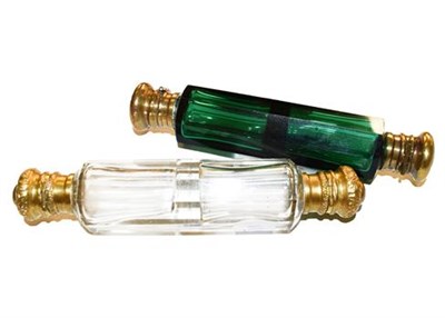 Lot 336 - A clear glass double ended scent bottle, and a green glass double scent bottle (2)
