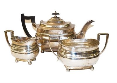 Lot 363 - ~A George V silver three piece tea service by William Hutton & Sons Ltd., marked for Sheffield...