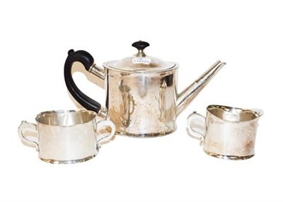 Lot 364 - ~An Elizabeth II silver three piece tea service marked for Sheffield 1983, makers mark PH,...