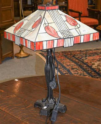 Lot 379 - A modern Art Deco style table lamp with mosaic glass shade