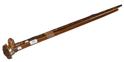 Lot 403 - A Cantonese stained ivory mounted walking cane, Meiji period, the handle finely carved with a...