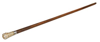 Lot 404 - An ivory and pique mounted Malacca walking cane, circa 1700, with brass ferrule, 91cm long