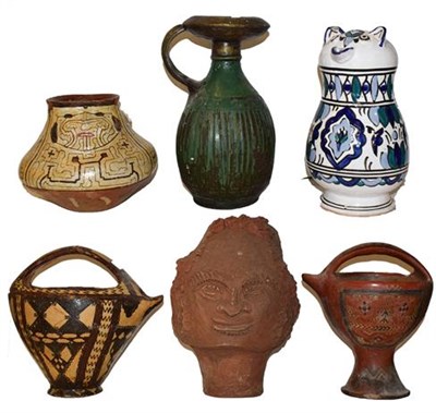 Lot 424 - Five earthenware vessels and a Tunisian jug (6)