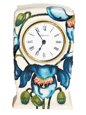 Lot 429 - ~A Moorcroft pottery mantel clock in a trial pattern on a cream ground, dated 09-01-13 with...