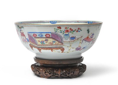 Lot 220 - A Chinese Porcelain Punch Bowl, Qianlong, painted in famille rose enamels with furniture,...
