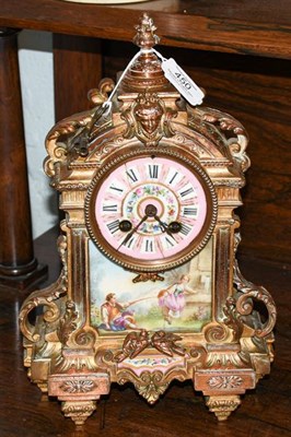 Lot 450 - An ormolu and porcelain mantel clock, circa 1880