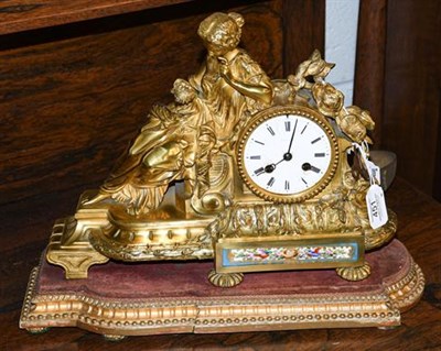 Lot 451 - A porcelain mounted mantel clock, circa 1890